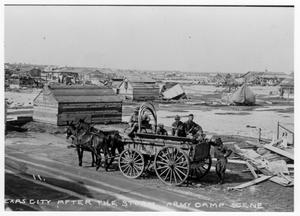 Primary view of object titled '[Photograph of Texas City After Storm, Army Camp Scene]'.
