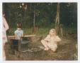 Photograph: [Children Sitting Next to a Campfire]