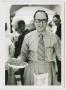 Photograph: [Photograph of man in apron]