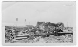 Primary view of object titled '[Damaged storage tank and debris after the 1947 Texas City Disaster]'.