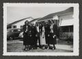 Photograph: [Six People in Front of House]