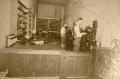 Photograph: [Early Shoe Repair Store]