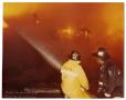 Photograph: [Two Firemen at a Fire Scene]