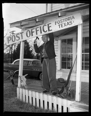 Primary view of object titled 'Guyler Hamblen retiring the Post Office Sign in Fostoria, Texas'.