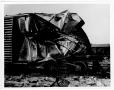 Photograph: [A ruined railroad car after the 1947 Texas City Disaster]
