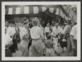 Photograph: [Family in Busy Street]