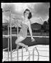 Primary view of [Woman Posing on a Lifeguard Chair]