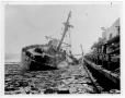 Primary view of [Wrecked fore end of the Wilson B. Keene in Main Slip after the 1947 Texas City Disaster]