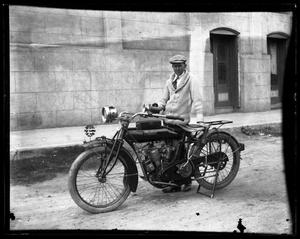 Primary view of object titled '[Portrait of Man and Indian Motorcycle]'.