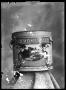 Photograph: [Old Homestead Coffee Can]