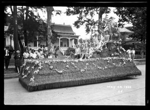 Primary view of object titled '[Parade Float at Maifest]'.