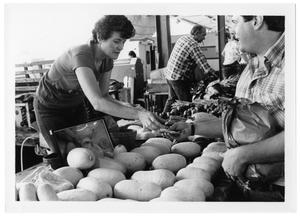 Primary view of object titled '[Seller at Farmer's Market]'.