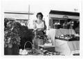 Thumbnail image of item number 1 in: '[Girl at Produce Stand]'.