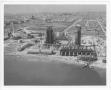 Thumbnail image of item number 1 in: '[Aerial view of refinery facilities and the storage tank farm before the 1947 Texas City Disaster]'.