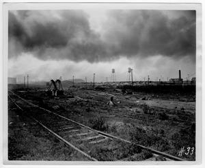 Primary view of object titled '[Debris along the railroad tracks after the 1947 Texas City Disaster]'.