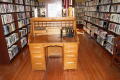 Photograph: [Desk and Bookshelves]