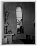 Photograph: [Broken window in a church after the 1947 Texas City Disaster]