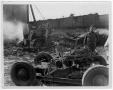Photograph: [Military personnel looking at damaged machinery after the 1947 Texas…