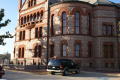 Primary view of [Car Parked Outside Courthouse]