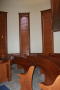 Photograph: [Benches in Courtroom]