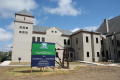 Primary view of [Sign in Front of Building]