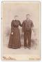Photograph: [Unknown Man and Woman Wearing All Dark Clothing]