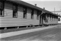Photograph: [Dog in Front of Barracks]