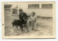 Photograph: [Aron Ellis Alexander and Martha Scott With Family Dog]