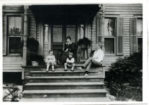 Primary view of object titled '[Fuller Family Members Sitting on Front Porch]'.