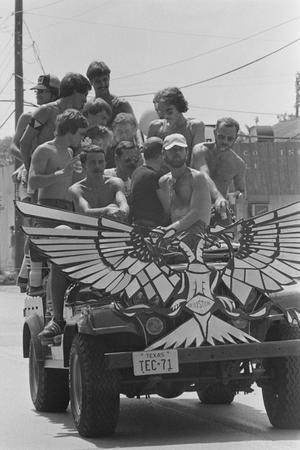 Primary view of object titled '[Group of Men in Off-Road Vehicle at Gay Pride Houston]'.