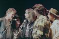Photograph: [Group of Musicians Singing at Austin City Limits 15th Anniversary Sh…