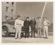 Photograph: [Five Men Standing in Front of Fire Engine]