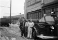 Photograph: [Three Men with Pasadena Fire Department Fire Engine]