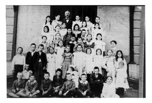 Primary view of object titled 'Low Fourth Grade Class at the Denton City School'.