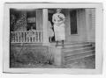 Primary view of [Unidentified Girl Standing on a Baluster]