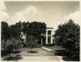 Photograph: [Front exterior of Governor's Mansion with trees]