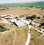 Thumbnail image of item number 1 in: 'Aerial Photograph of Weldon Edwards Livestock Auction (Clyde, TX)'.