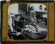 Photograph: Glass Slide of Women Sitting on Deck Chairs on a Ship