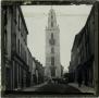 Photograph: Glass Slide of Clock Tower in Front of Unidentified Church (Europe)