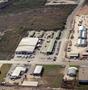 Thumbnail image of item number 1 in: 'Aerial Photograph of Abilene Lumber & Truss Plant (Abilene, Texas)'.
