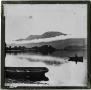 Photograph: Glass Slide of Man in Rowboat on Unidentified Lake