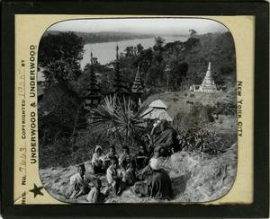 Primary view of object titled 'Glass Slide of Schoolboys and their teacher beside the Irrawaddy River (Burma)'.