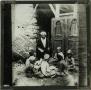 Primary view of Glass Slide of Arab Boys and Teacher
