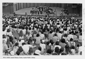 Primary view of object titled '[Crowd watches a concert on the hillside at Zilker Hillside Theater]'.