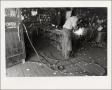 Primary view of [Man welding at Weigl Iron Works in Austin, Texas]