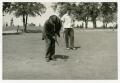 Thumbnail image of item number 1 in: '[Golfers putting on green at Municipal Golf Course]'.