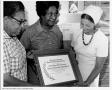 Photograph: [Delta Sigma Theta members receive certificate]
