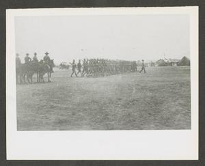 Primary view of object titled '[Cavalry Men Marching in Field]'.