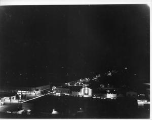 Primary view of object titled '[Rosenberg at night during World War II, taken from water tower]'.