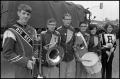 Photograph: [Different School Marching Band Members Pose at Armed Forces Day Para…